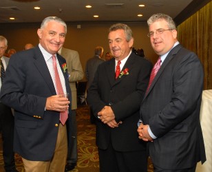 Former MGWA President Martin Davis and MGWA Board member Dan Berger flank 2012 Gold Tee Award winner Tony&nbsp;Jacklin