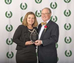 2019 Dave Anderson Spotlight Award recipient Kelli Clayton with MGWA President Dave Donelson