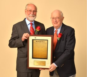 Former MGWA President Ron Sirak receives the 2015 Lincoln Werden Golf Journalism Award from MGWA Board member Dave Anderson